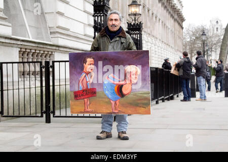Westminster London, UK. 7. Januar 2015. Satirische Bilder des Künstlers Kaya Mar das Treffen zwischen Angela Merkel bei der Downing Street London Credit angezeigt: Amer Ghazzal/Alamy Live-Nachrichten Stockfoto