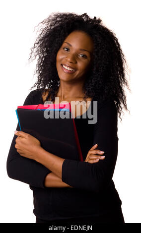 Junge Frau hält Ordner isoliert auf weiss. Stockfoto