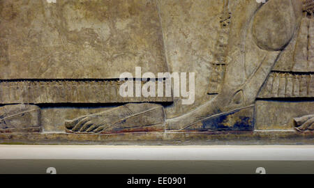 British Museum, London England UK. Assyrische Löwenjagd. Januar 2015 König Ashurbanipal Jagd Löwen. Bas-Relief-Panel in geschnitzt Stockfoto