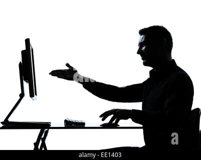 eine kaukasische Business Mann zeigt Geste Computer computing Silhouette im Studio isoliert auf weißem Hintergrund Stockfoto