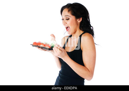 Junge Frau mit Stäbchen essen sushi Stockfoto