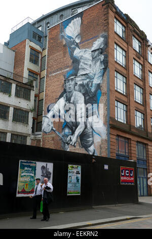 Badmintonspieler auf eine Giebelwand gemalt für den XX Commonwealth Games in Glasgow, 2014. Stockfoto