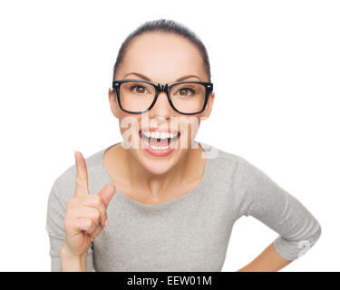 asiatische Frau in Brillen mit finger Stockfoto