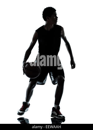 ein junger Mann-Basketball-Spieler-Silhouette im Studio isoliert auf weißem Hintergrund Stockfoto