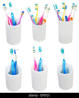 Sammlung von Zahnbürsten in Keramik Brille isoliert auf weißem Hintergrund Stockfoto