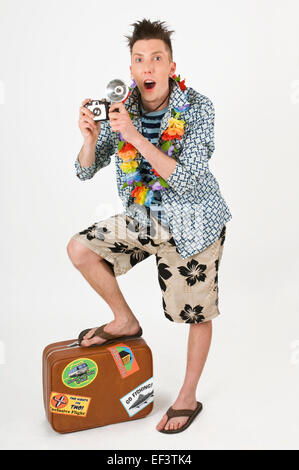 Mann im Urlaub, die Kamera zu halten Stockfoto