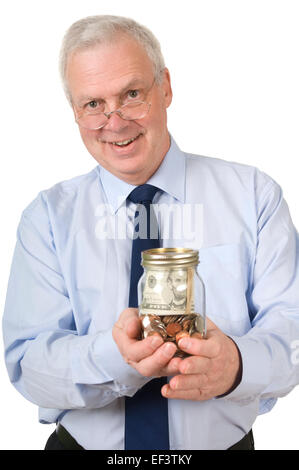 Geschäftsmann Betrieb Glas mit Münzen Stockfoto
