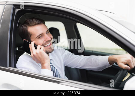 Glücklich Kaufmann am Telefon Stockfoto