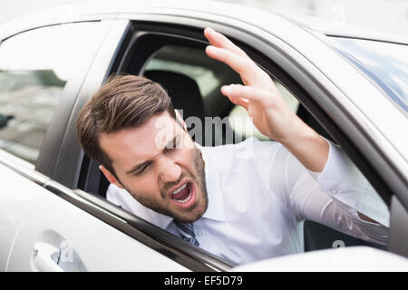 Geschäftsmann erleben Wut im Straßenverkehr Stockfoto