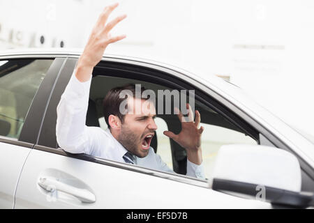 Geschäftsmann erleben Wut im Straßenverkehr Stockfoto