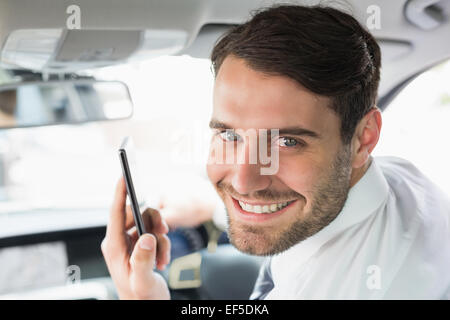 Jungunternehmer am Telefon Stockfoto