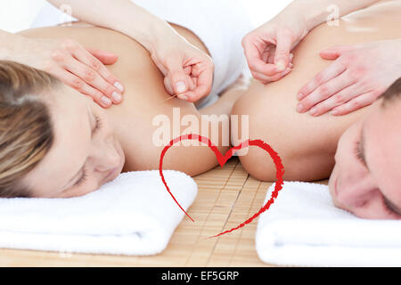 Zusammengesetztes Bild des entspannten paar in einer Akupunktur-Therapie Stockfoto