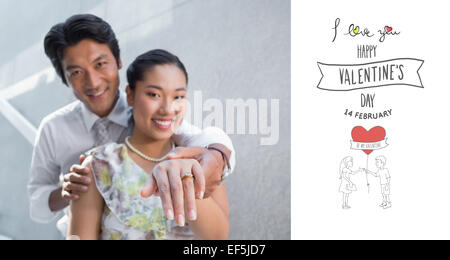 Zusammengesetztes Bild von paar zeigt Verlobungsring am Finger womans Stockfoto