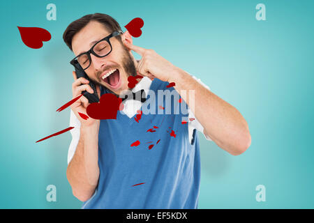 Zusammengesetztes Bild geeky Hipster sprechen auf eine Retro-Handy Stockfoto