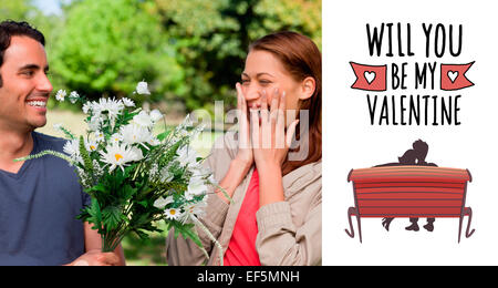 Composite image of young woman holding her hands against her face when presented with flowers Stockfoto