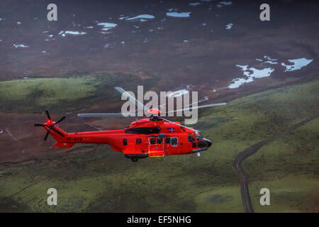 Luftbild-tf-syn, Suche und Rettung Hubschrauber fliegen von Gullfoss Wasserfall, Island. Stockfoto