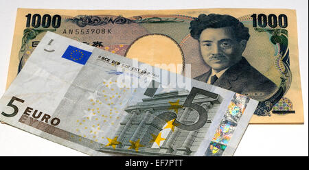 Euro und japanische Yen Banknoten Stockfoto