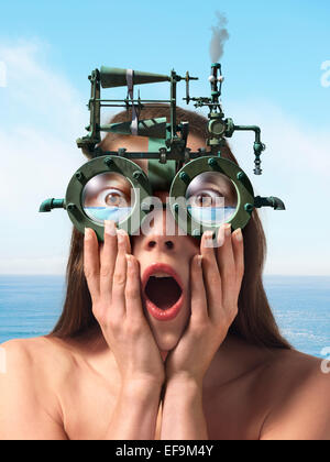 Fantasy Bild der Frau stand vor Ozean tragen Dampf angetrieben Brillen, die mit Wasser füllen Stockfoto