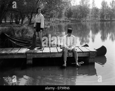 ROSALIND RUSSELL, Ray Milland, EINER FRAU, DER UNTERSCHEIDUNG, 1950 Stockfoto