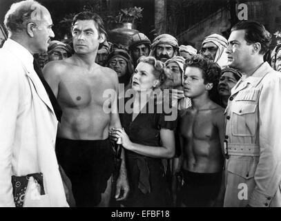 DENNIS HOEY, Johnny Weissmuller, BRENDA JOYCE, JOHNNY SHEFFIELD, EDGAR BARRIER, TARZAN UND DER LEOPARD FRAU, 1946 Stockfoto