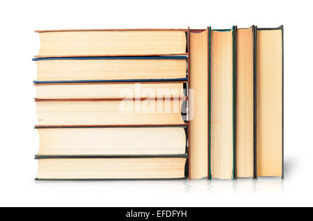 Stapelt der alten Bücher isoliert auf weißem Hintergrund Stockfoto