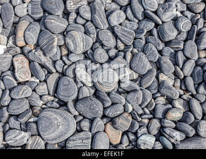 Natur Hintergrund aus trockenen runden Steinen gemacht. Stockfoto