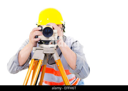 Landvermesser Arbeiter Mess- und isoliert auf weiss Stockfoto