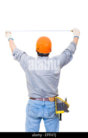 Arbeitnehmer mit einem Maßband isoliert auf weißem Stockfoto