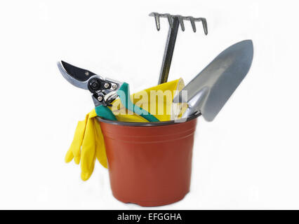 Elemente für den Garten-Schere, Schaufel, Rechen, Gummihandschuhe auf weißem Hintergrund. Stockfoto