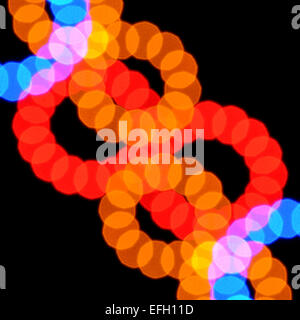 Abstrakte verschwommene Lichtern Muster bunte Kreise auf schwarzem Hintergrund. Stockfoto