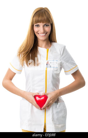Schöne Krankenschwester, rotes Herz Stockfoto