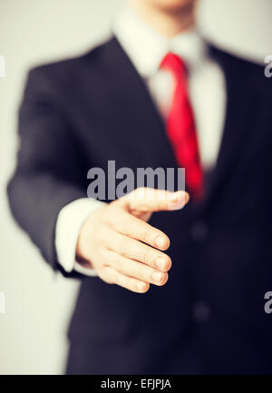 Geschäftsmann mit der offenen hand Stockfoto
