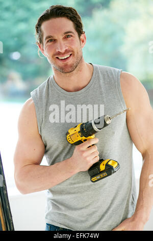 Mann-Betrieb-Bohrer Stockfoto