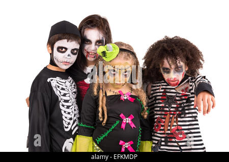 Kinder mit Gesicht malen und Halloween-Kostüme, die isoliert in weiß Stockfoto