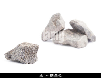 Granitstein vor mehreren Steinen Stockfoto