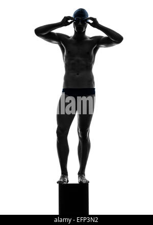 ein junger Mann Schwimmer schwimmen in der Silhouette auf weißem Hintergrund Stockfoto