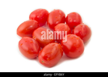 Nahaufnahme von mehreren Reife Eiertomaten (auch bekannt als eine Verarbeitung Tomaten oder Tomaten paste), isoliert auf weißem Hintergrund Stockfoto