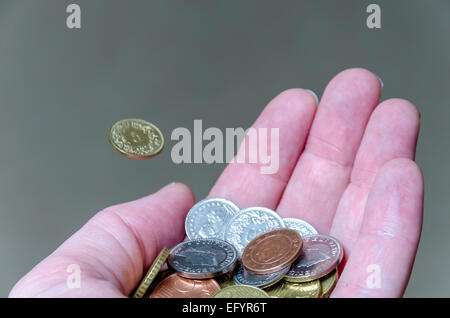 Euro-Münzen in der hand Stockfoto