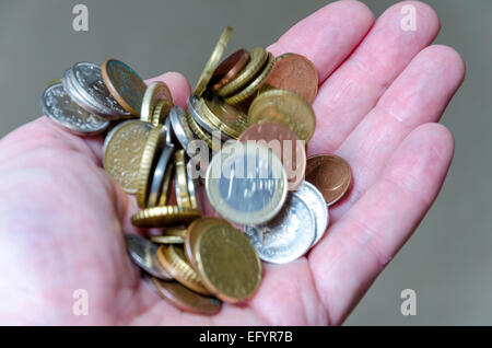 Euro-Münzen in der hand Stockfoto