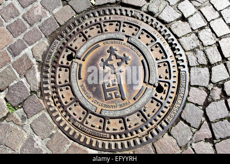 Mann-Loch Abdeckung in Bremen, Deutschland Stockfoto