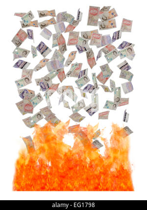 Konzept-Bild der britischen Banknoten fallen ins Feuer Stockfoto