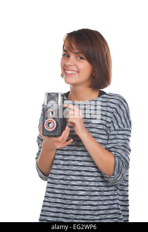 Schöne Teenager-Mädchen mit Retro-Foto-Kamera Stockfoto