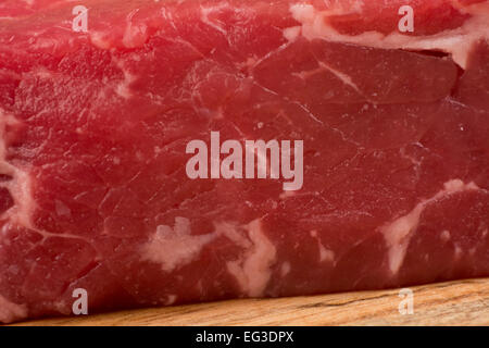 Marmoriertes Rinderfilet Strip Steak roh closeup Stockfoto