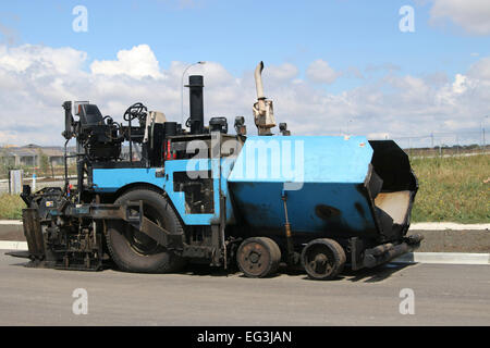 Asphalt-Einbau Maschine Stockfoto