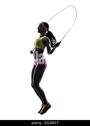 eine Frau, die Ausübung Fitness Seilspringen Silhouette auf weißem Hintergrund Stockfoto
