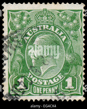 Australien - ca. 1924: Drei halben Pence rot Stempel gedruckt in Australien mit dem Porträt des englischen Königs George V, ca. 1924. Stockfoto