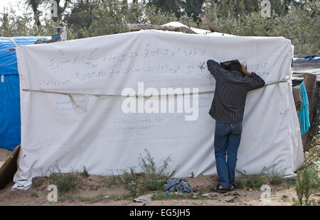 Alltag in The Camp "Jungle" in Calais, Frankreich, wo Hunderte von Migranten richten Sie zu Hause, mit vielen Hoffnung England eingeben Stockfoto