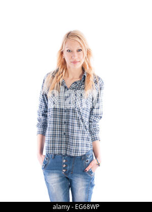 Schöne Mädchen in einem karierten Hemd und Jeans auf weißem Hintergrund. Stockfoto