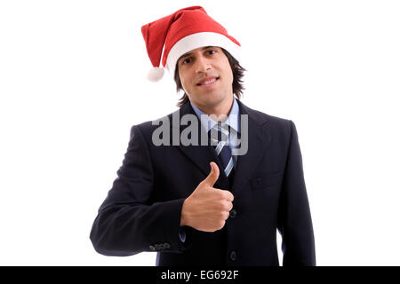Geschäftsmann mit Weihnachtsmütze Daumen auftauchen Stockfoto