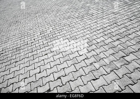 Abstrakte urban Hintergrundtextur von modernen graue Kopfsteinpflaster Straße Stockfoto